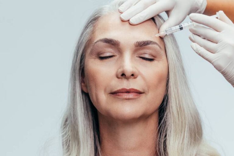 Senior woman getting cosmetic injection